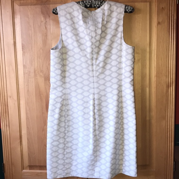 This is a very flattering dress and the textured design is gorgeous and unique. - Picture 3 of 3